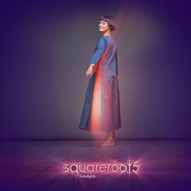 Experimental&nbsp; turquoise dress with big side pockets and orange accents.